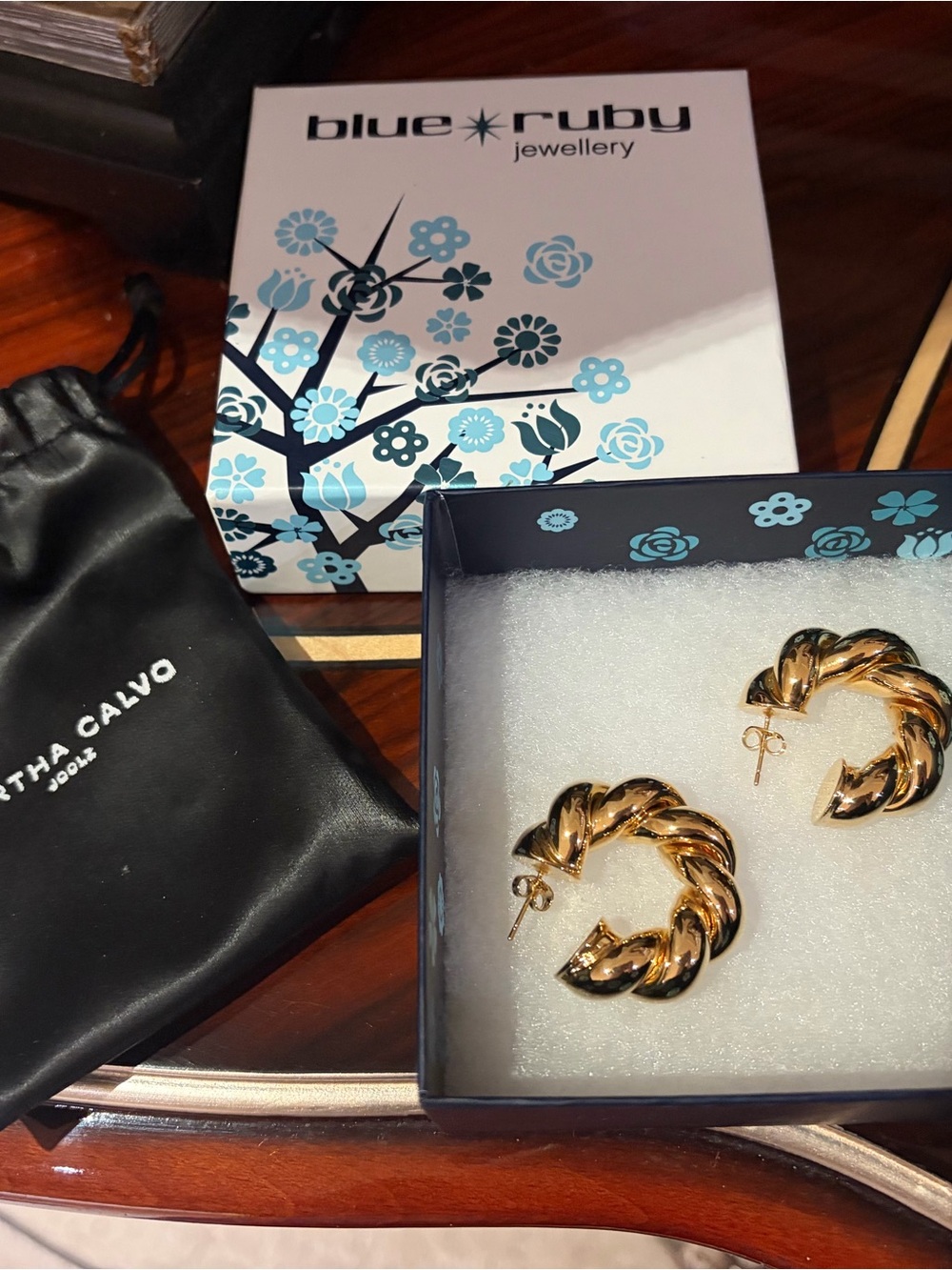 (Never worn with box)Gold-Tone Twisted Hoop Earrings by Martha Calvo(blue ruby)